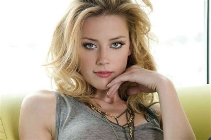 Amber Heard Reflects On Coming Out To Religious Parents “They Couldn’t Process It”