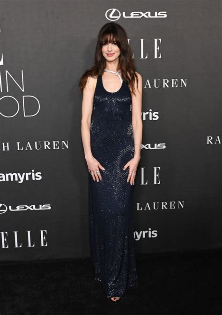 Anne Hathaway in Bathing Suit Top Says "Happy New Year" — Celebwell