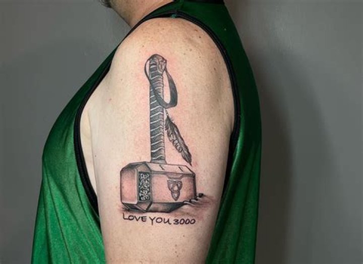 Does Armie Hammer have tattoos?