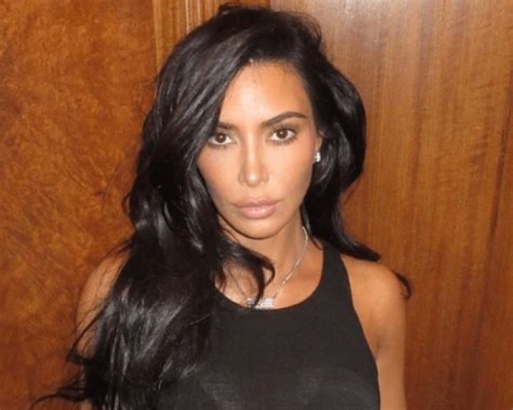 Icon Kim Kardashian Shares Swimsuit Photo From "Paradise"