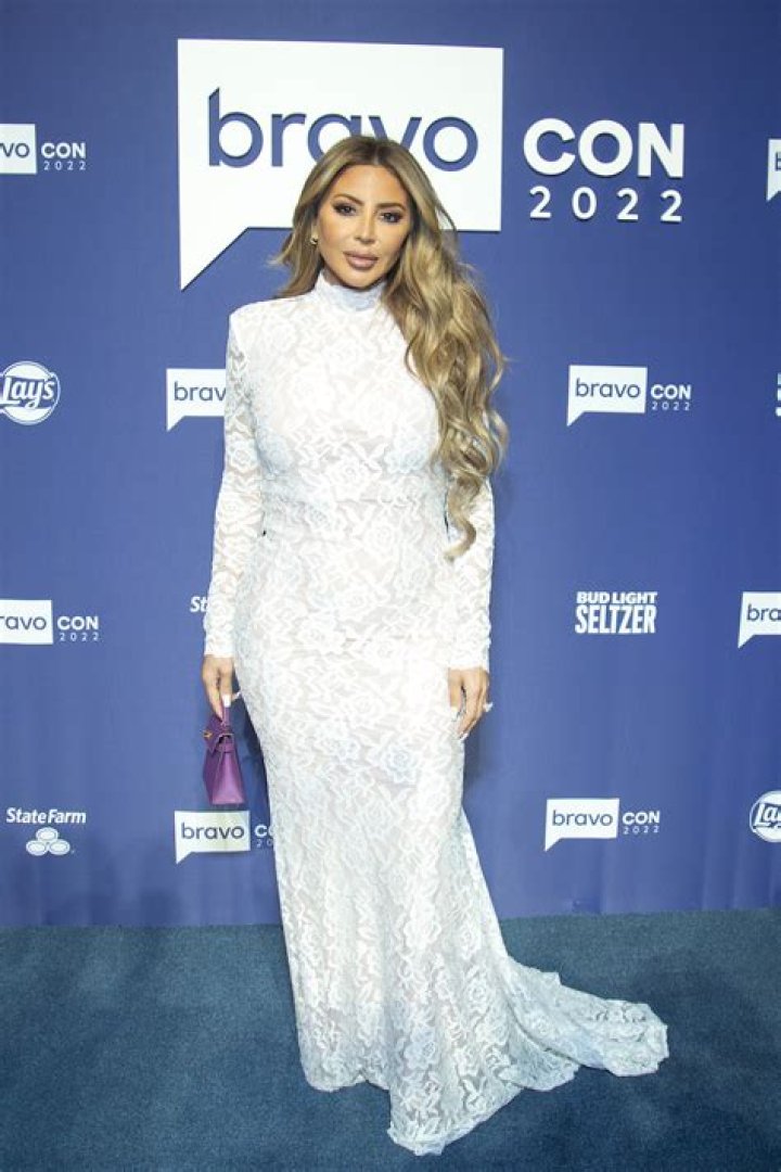 Larsa Pippin in Black Sports Bra and Matching Short Skirt Plays Golf