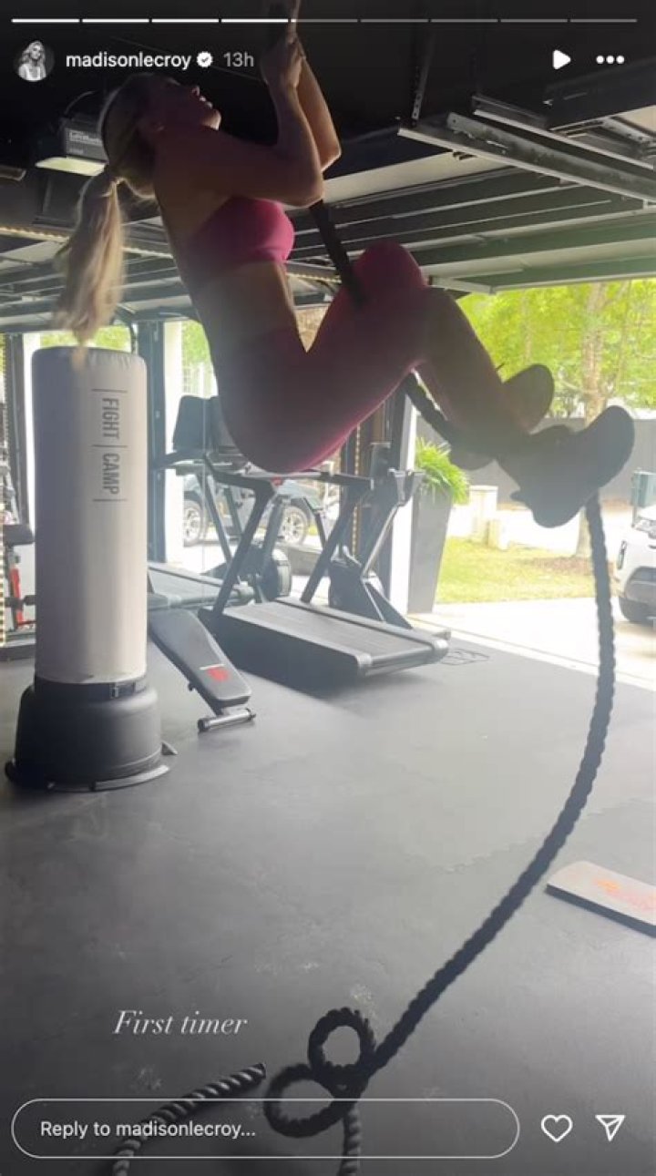 Madison LeCroy in Two-Piece Workout Gear Climbs a Rope as a "First-Timer"