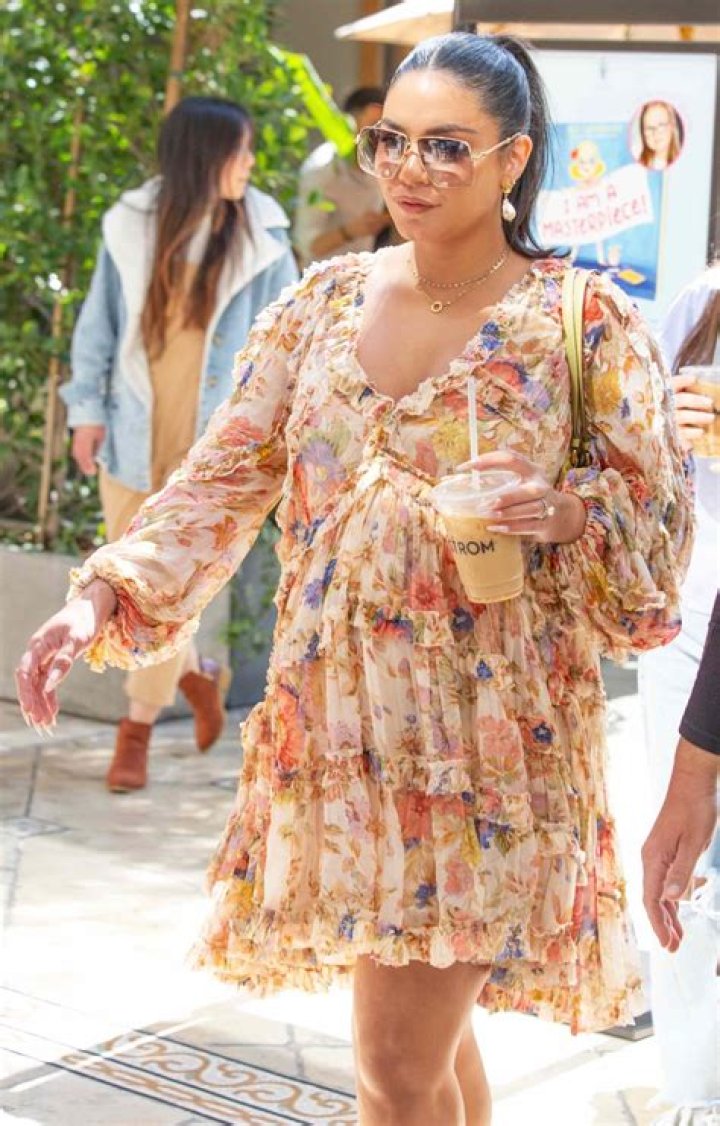 Nikki Bella Shows Off Her Baby Bump While Dancing In Her Barely There WWE Outift!