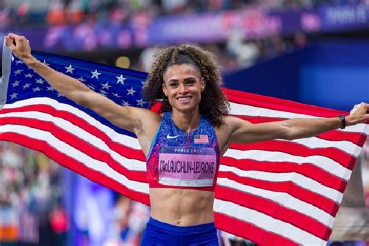 Why did Sydney McLaughlin change coaches?